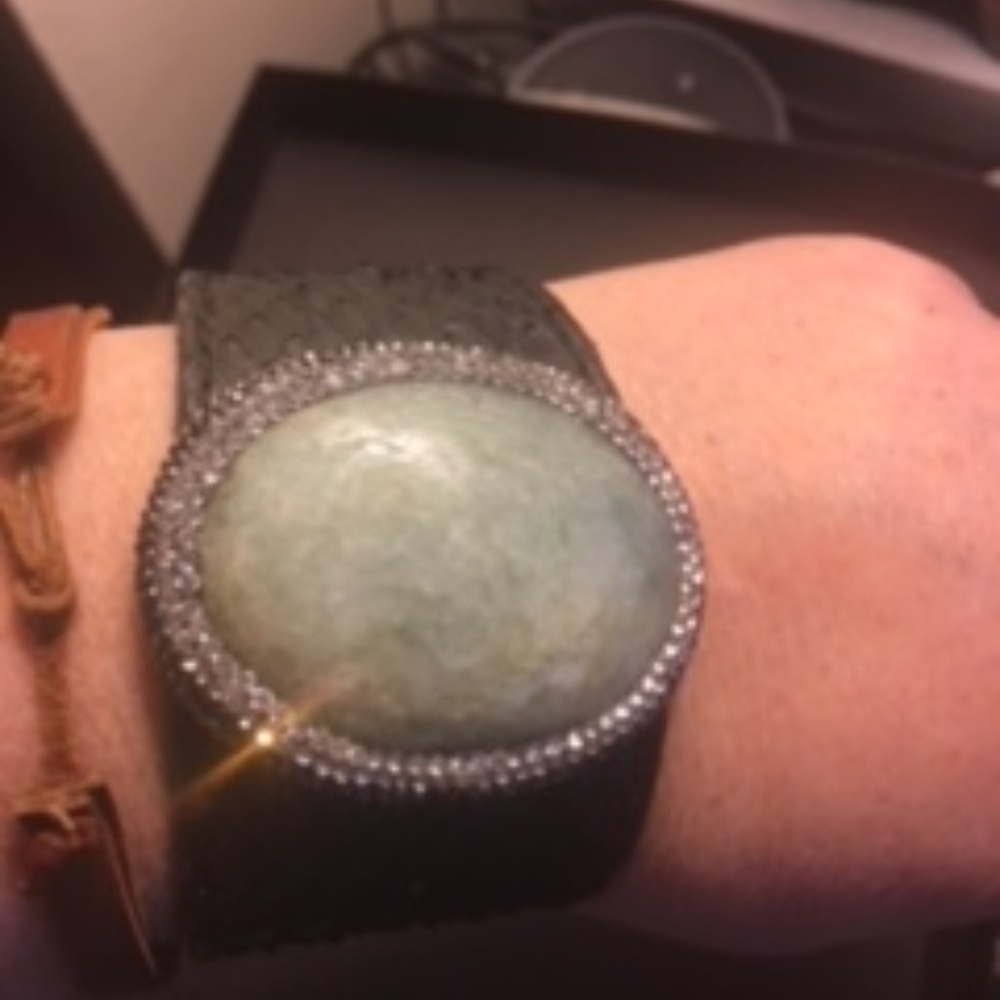 Leather bracelet with stone and crystals.
